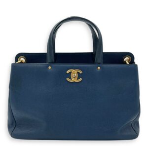 CC Lock Top Handle Bag Blue in Caviar Leather, Gold hardware