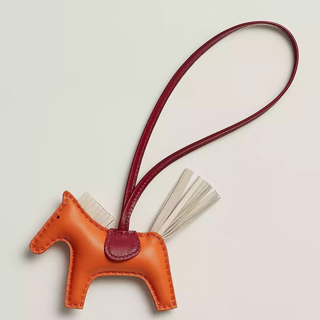 Hermes Rodeo PM Bag Charm in Orange/Craie/Red Lambskin